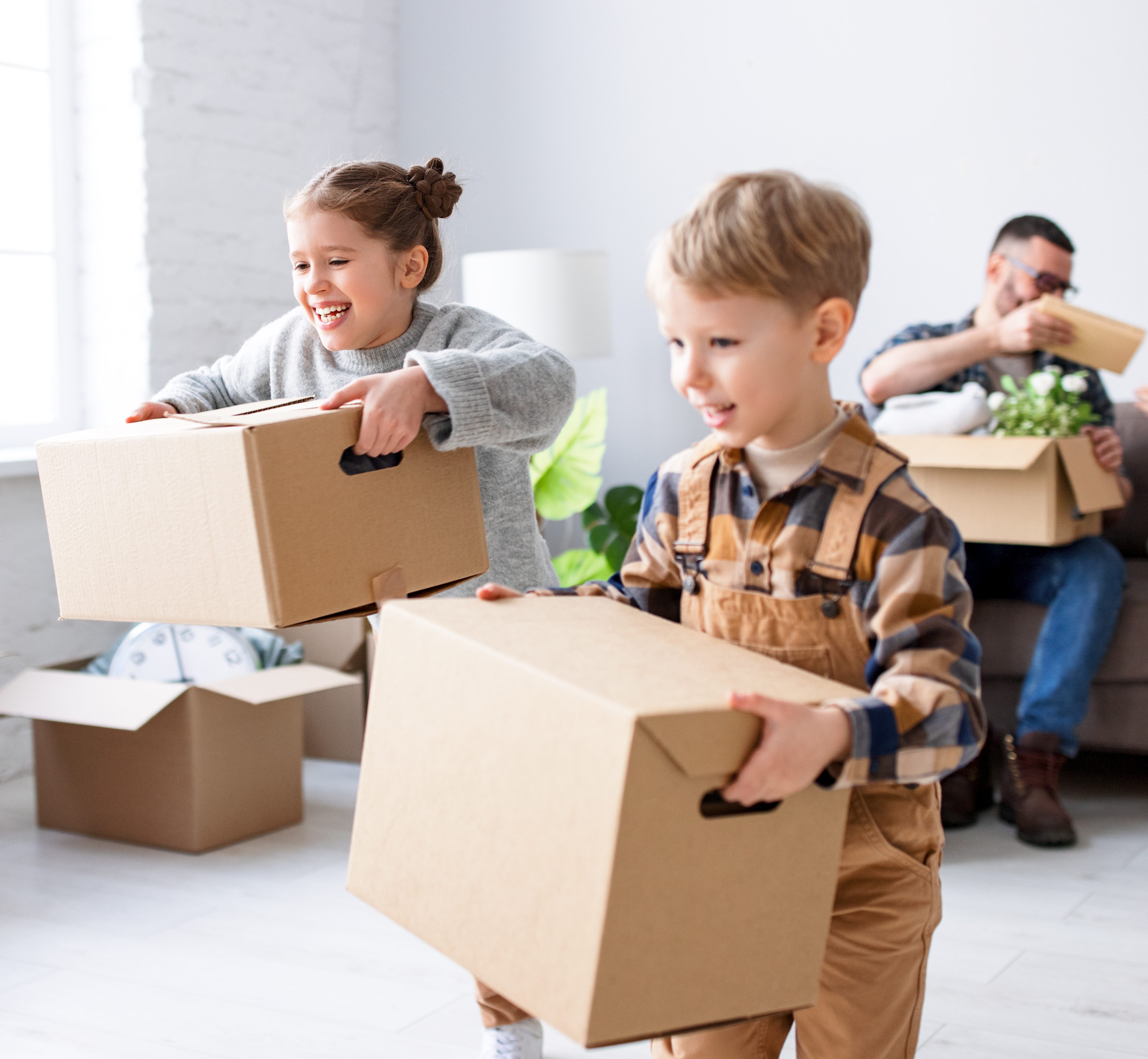 Family in new flat during relocation